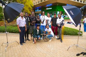 A student at Music and Film Academy Nairobi capturing urban life in the CBD as part of our photography courses in Kenya.