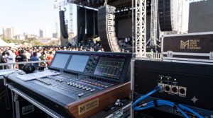 A high-performance live event mixing station demonstrating the deployment of digital audio networks via managed gigabit switches and Dante architectures at a Nairobi festival under training from the Music And Film Academy.